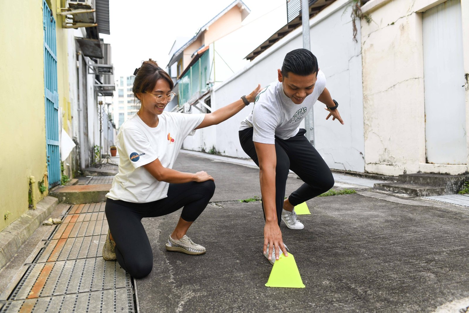 patient tapping yellow cone